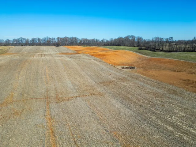 a view of a swimming pool and an outdoor space