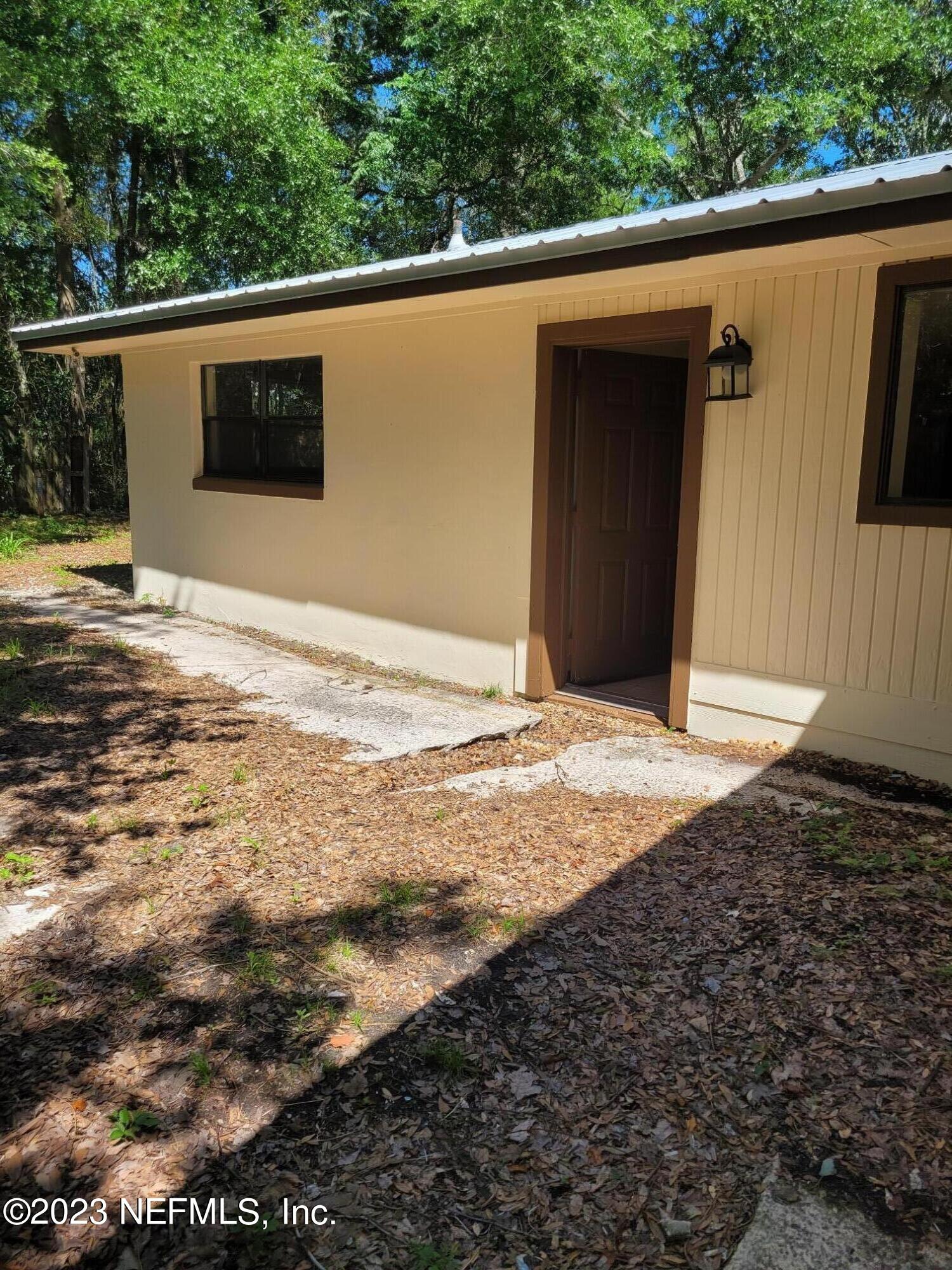 7925 Chateau Drive Jacksonville, FL 32221 - Photo 24 of 24 a view of a backyard of the house