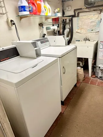 a utility room with dryer and washer