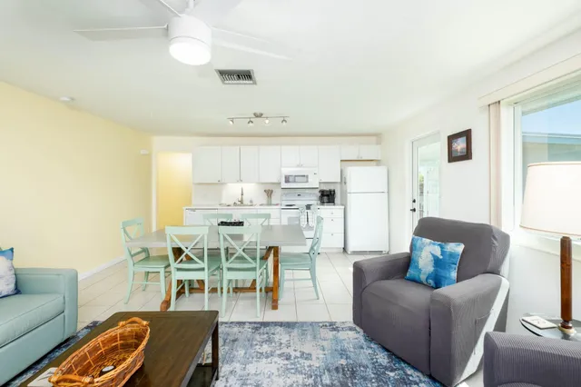 a bedroom with a bed and a table in it