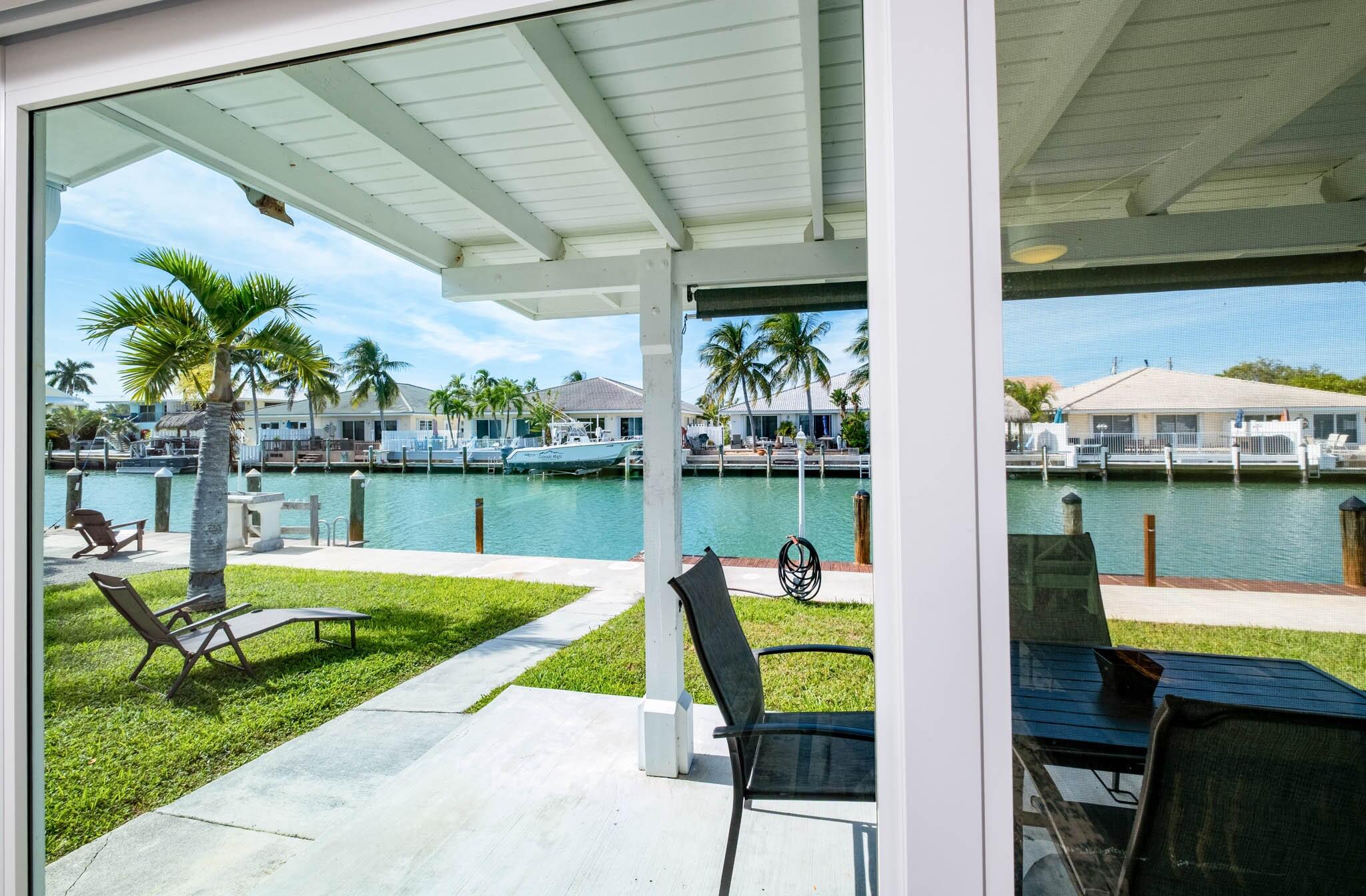 261-271 9th Street Key Colony Beach, FL 33051 - Photo 18 of 68 a view of yard from deck with patio