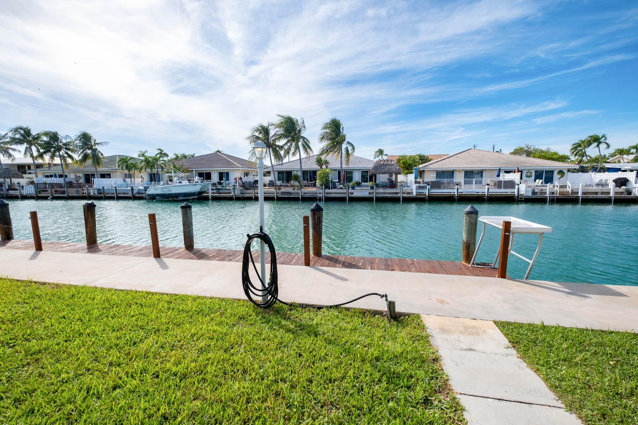 261-271 9th Street Key Colony Beach, FL 33051 - Photo 26 of 68 a view of a lake with sitting area