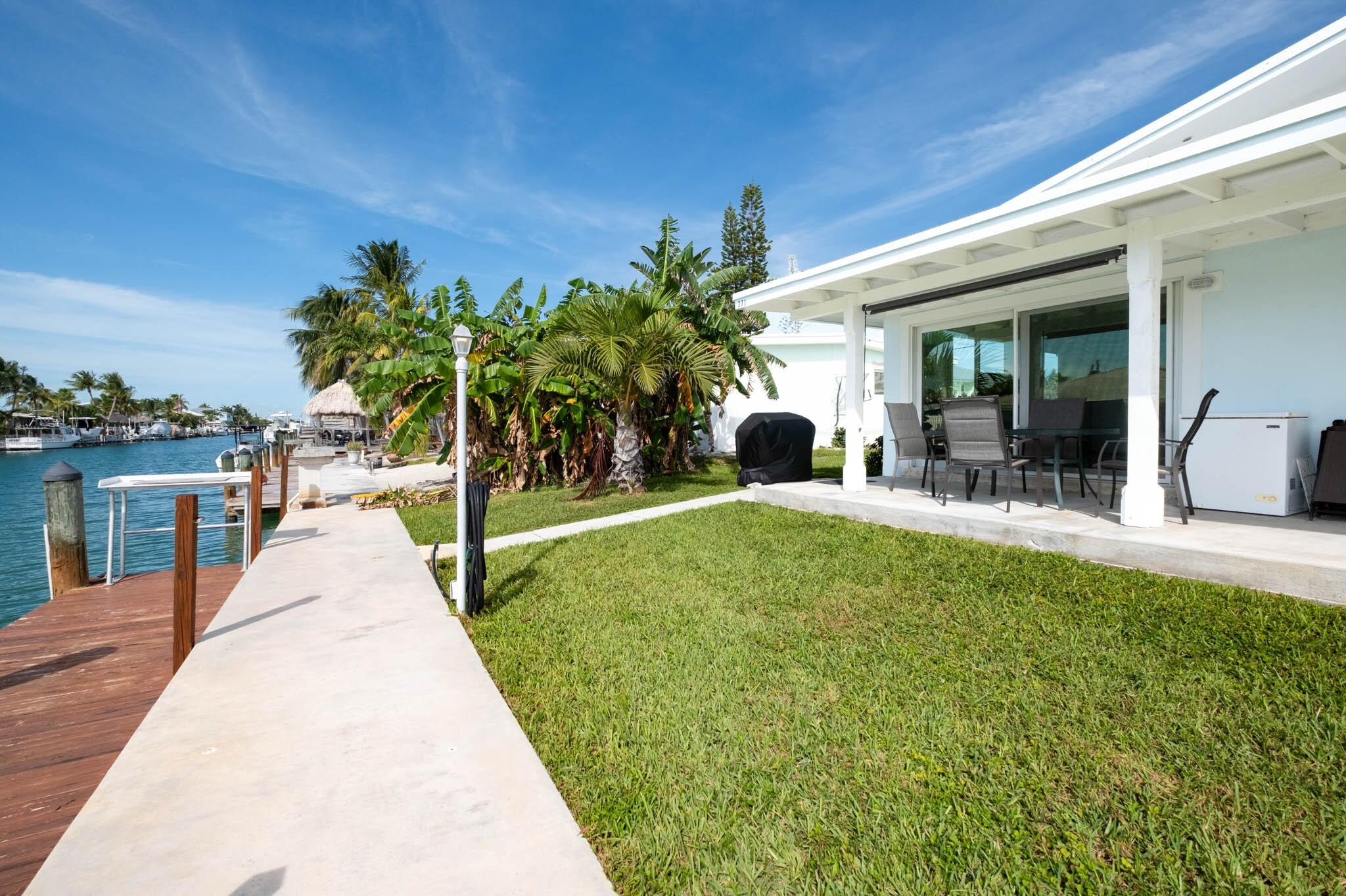 261-271 9th Street Key Colony Beach, FL 33051 - Photo 29 of 68 a view of a house with swimming pool and sitting area