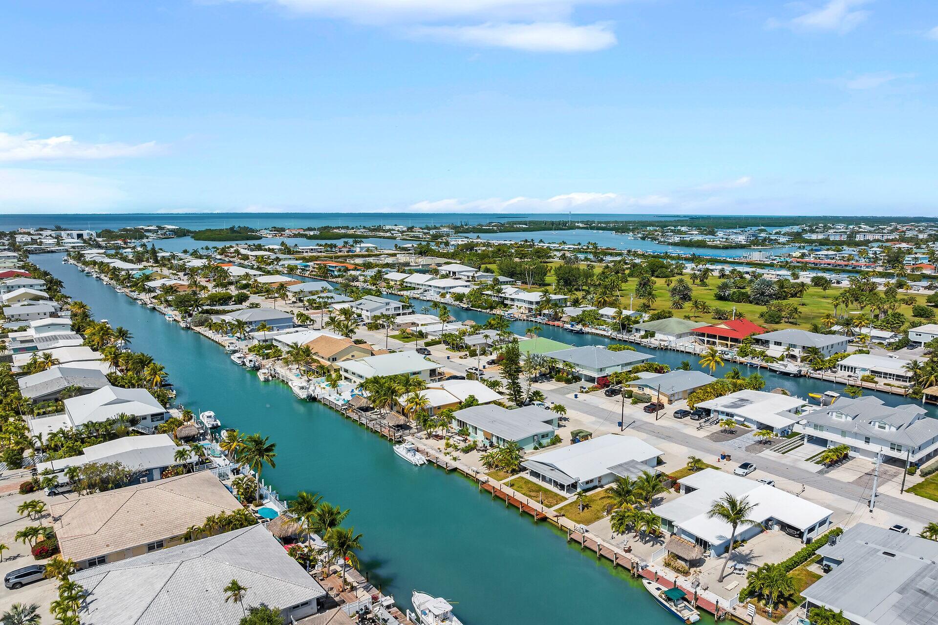 261-271 9th Street Key Colony Beach, FL 33051 - Photo 3 of 68 an aerial view of a city with ocean view