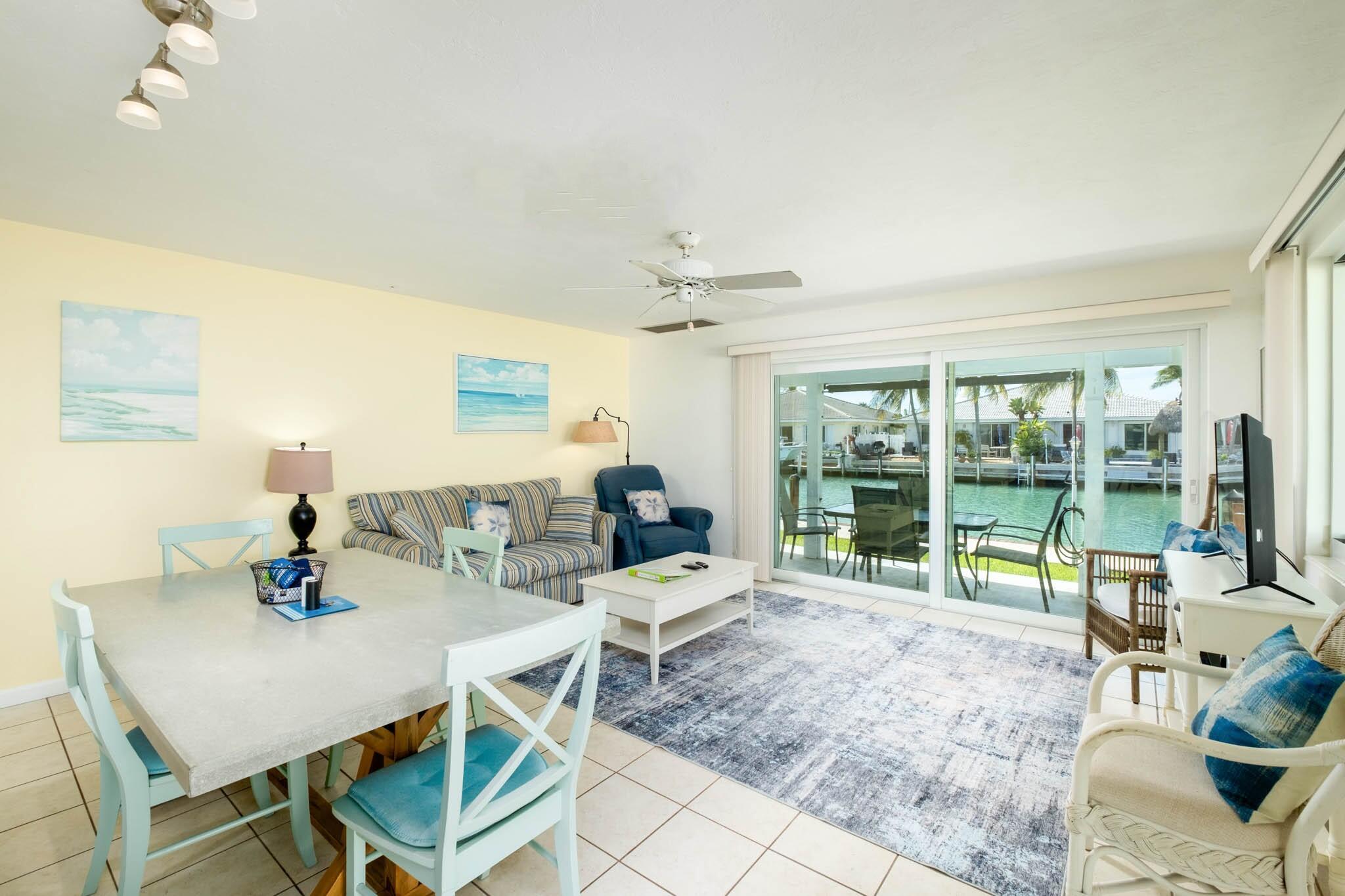 261-271 9th Street Key Colony Beach, FL 33051 - Photo 36 of 68 a living room with furniture floor to ceiling window and floor to ceiling window