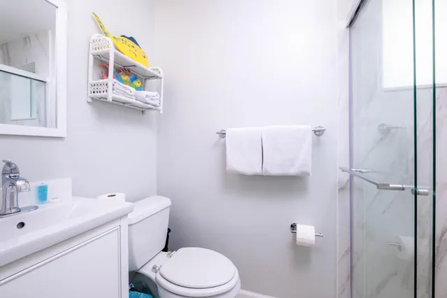 a swimming pool with outdoor seating and yard