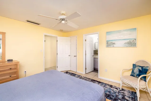 an aerial view of a city with ocean view