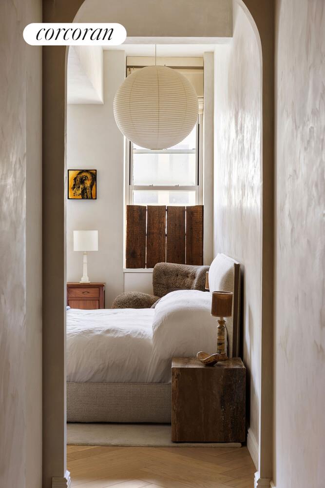 315 7th Avenue, Unit 4D Manhattan, NY 10001 - Photo 13 of 19 a bedroom with a bed and window