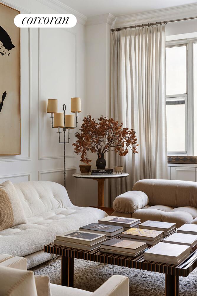 315 7th Avenue, Unit 4D Manhattan, NY 10001 - Photo 4 of 19 a living room with furniture and window