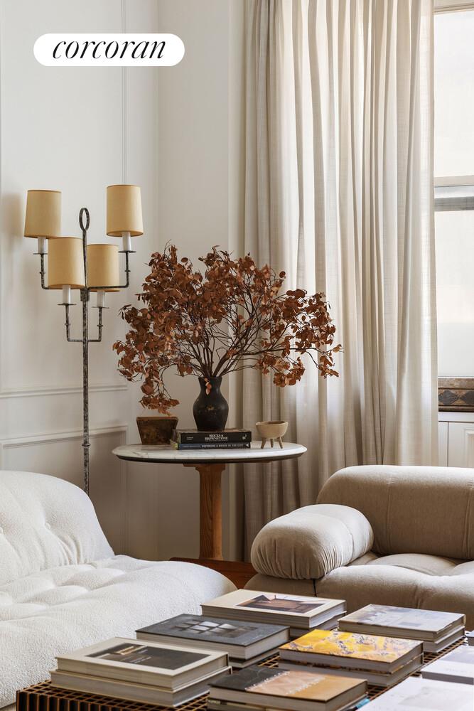 315 7th Avenue, Unit 4D Manhattan, NY 10001 - Photo 5 of 19 a living room with furniture and window
