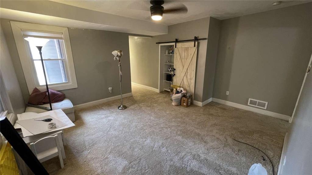 615 Tripoli Street Pittsburgh, PA 15212 - Photo 11 of 25 wooden floor and chair in a room
