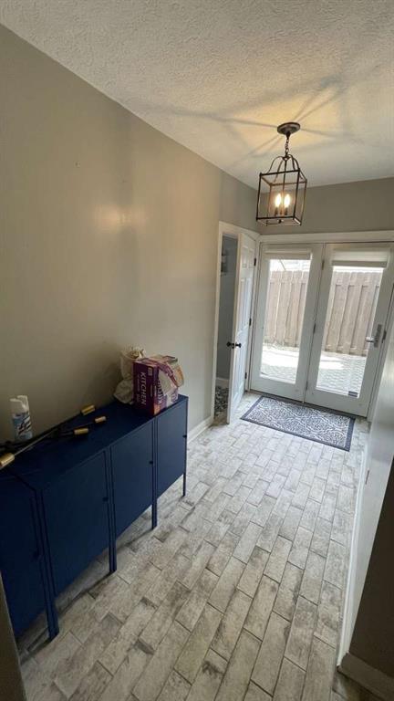 615 Tripoli Street Pittsburgh, PA 15212 - Photo 8 of 25 a room with hard wood flooring and decorative lights