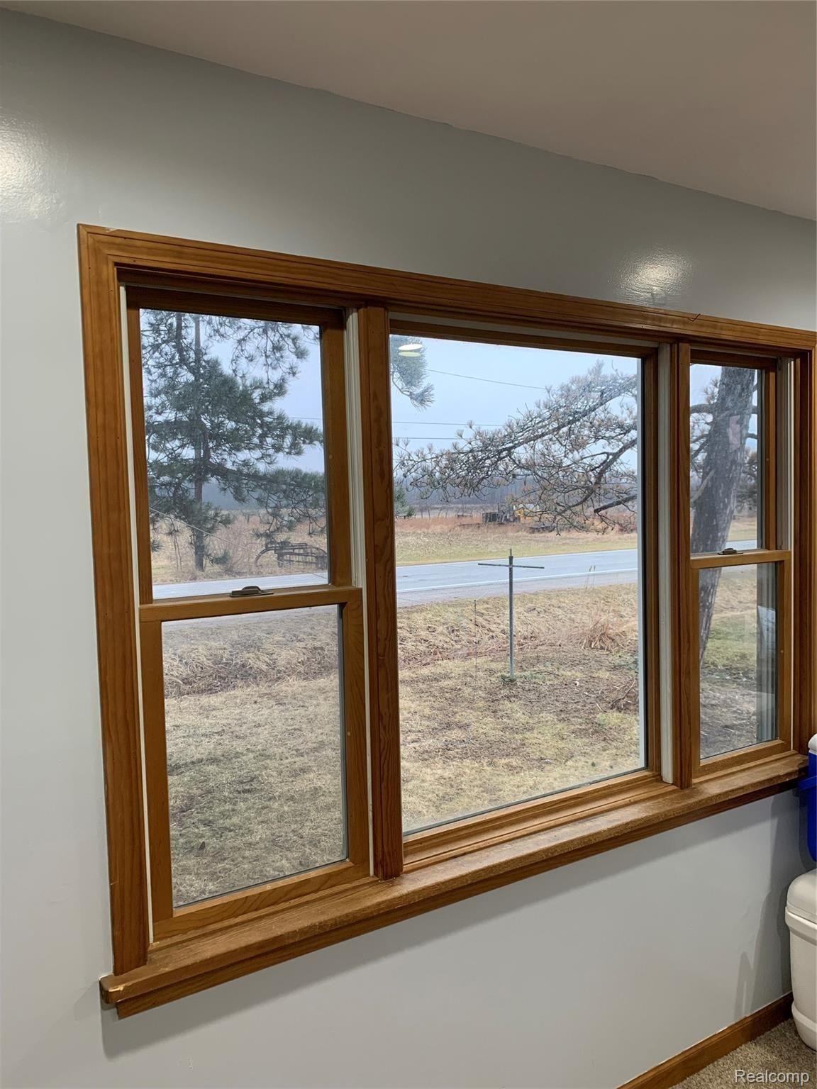 7078 Fargo Road Avoca, MI 48006 - Photo 11 of 41 front room facing road. Nice view