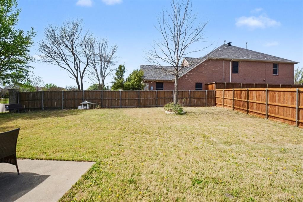 10005 Turrey Rowlett, TX 75089 - Photo 29 of 32 Fenced backyard featuring a patio area