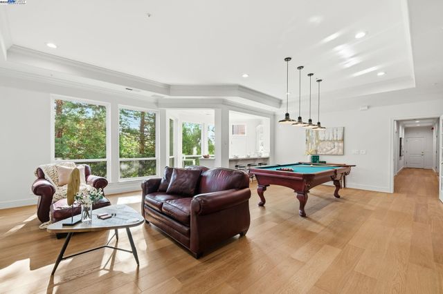 a living room with furniture and a table