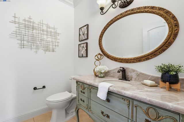 a view of a balcony with chairs