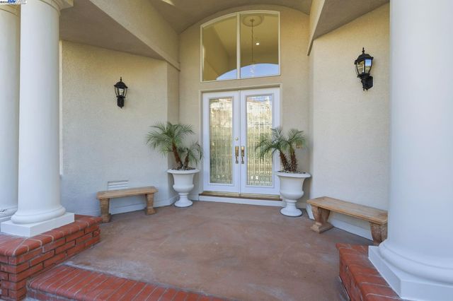 a view of an entryway with staircase