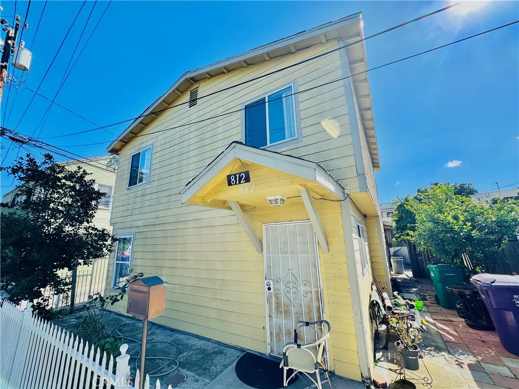 812 East 8th Street Long Beach, CA 90813 - Photo 1 of 40 a front view of a house with outdoor space