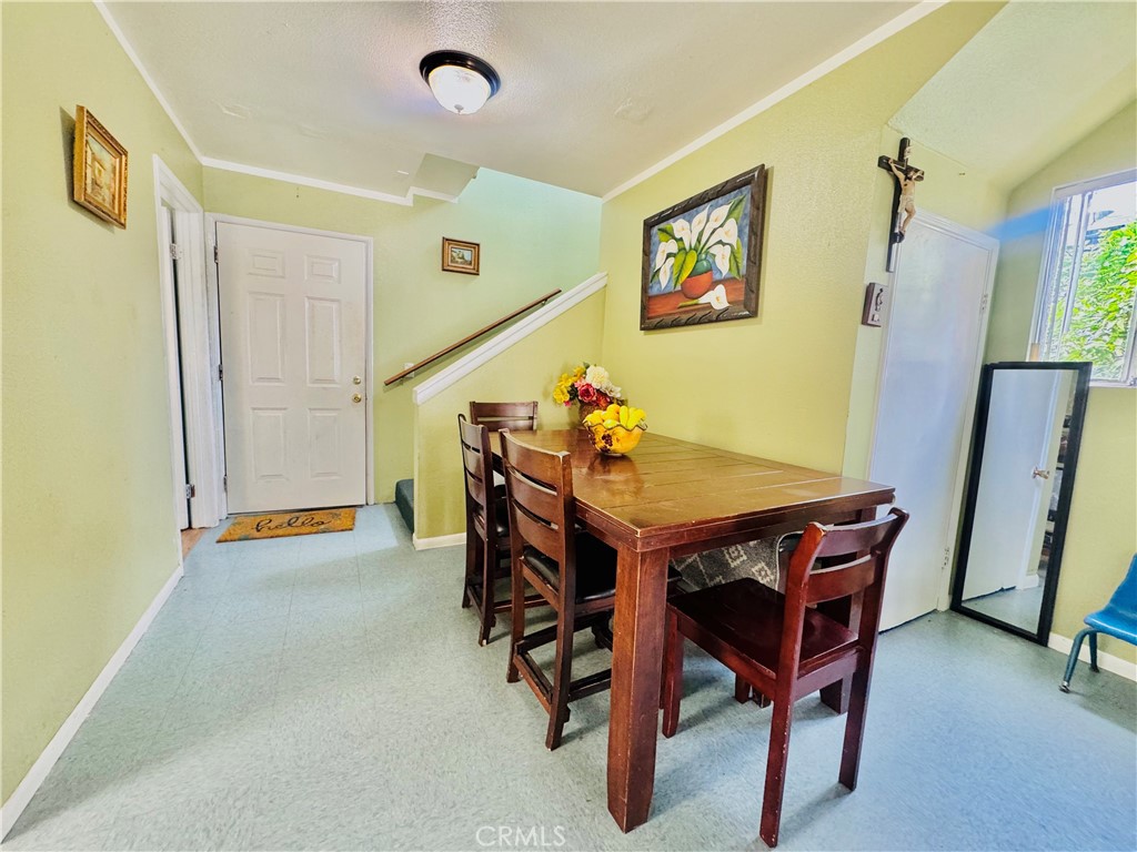 812 East 8th Street Long Beach, CA 90813 - Photo 16 of 40 a dining room with furniture and window