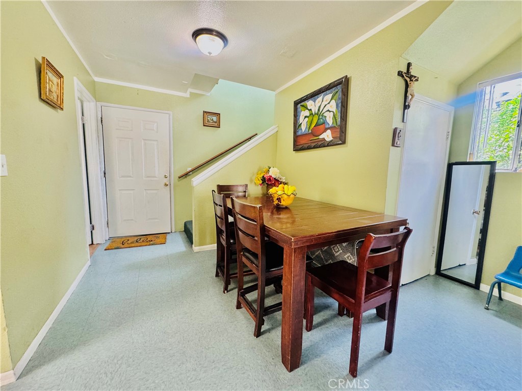 812 East 8th Street Long Beach, CA 90813 - Photo 17 of 40 a view of a dining room with furniture and window
