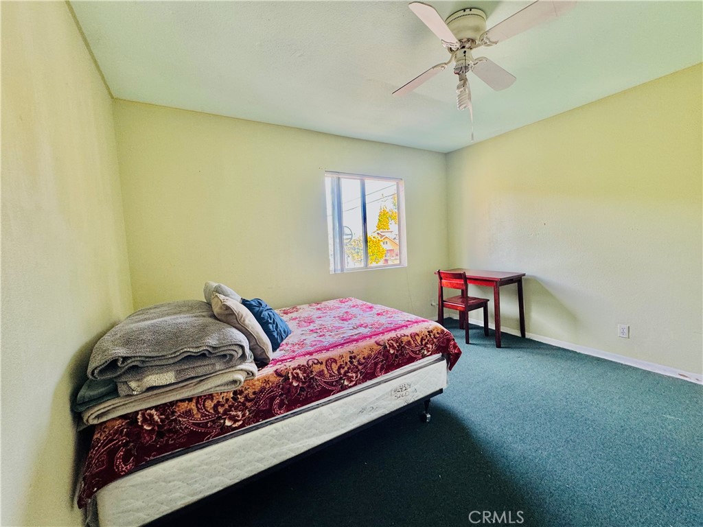 812 East 8th Street Long Beach, CA 90813 - Photo 37 of 40 a bedroom with a bed and a window