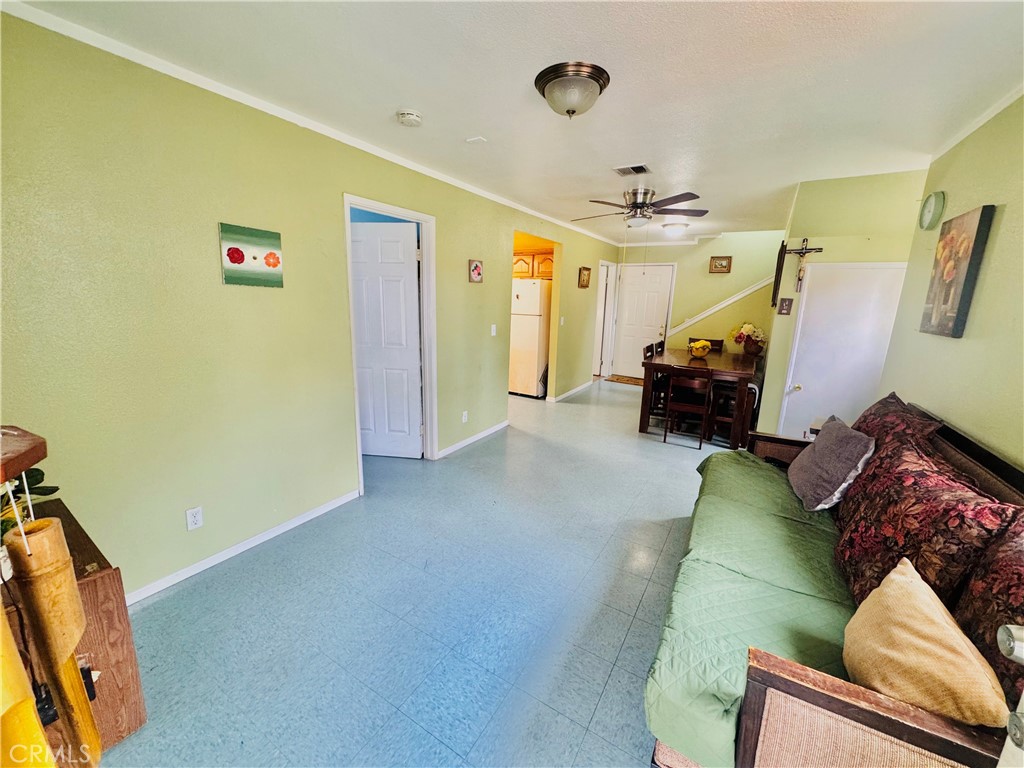 812 East 8th Street Long Beach, CA 90813 - Photo 6 of 40 a living room with furniture and a chandelier