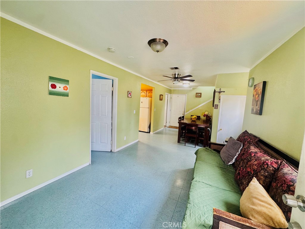 812 East 8th Street Long Beach, CA 90813 - Photo 7 of 40 a living room with furniture and a ceiling fan