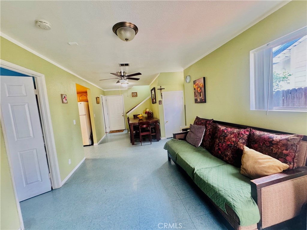 812 East 8th Street Long Beach, CA 90813 - Photo 8 of 40 a living room with furniture and a window