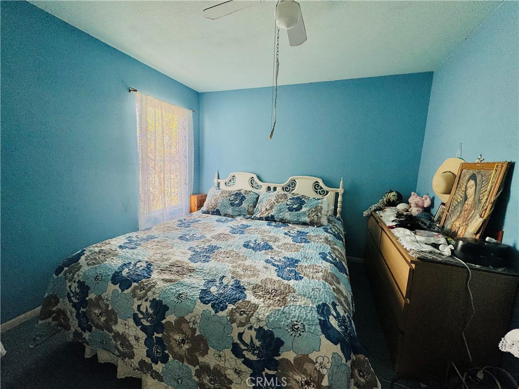 812 East 8th Street Long Beach, CA 90813 - Photo 10 of 40 a bedroom with a bed and a window