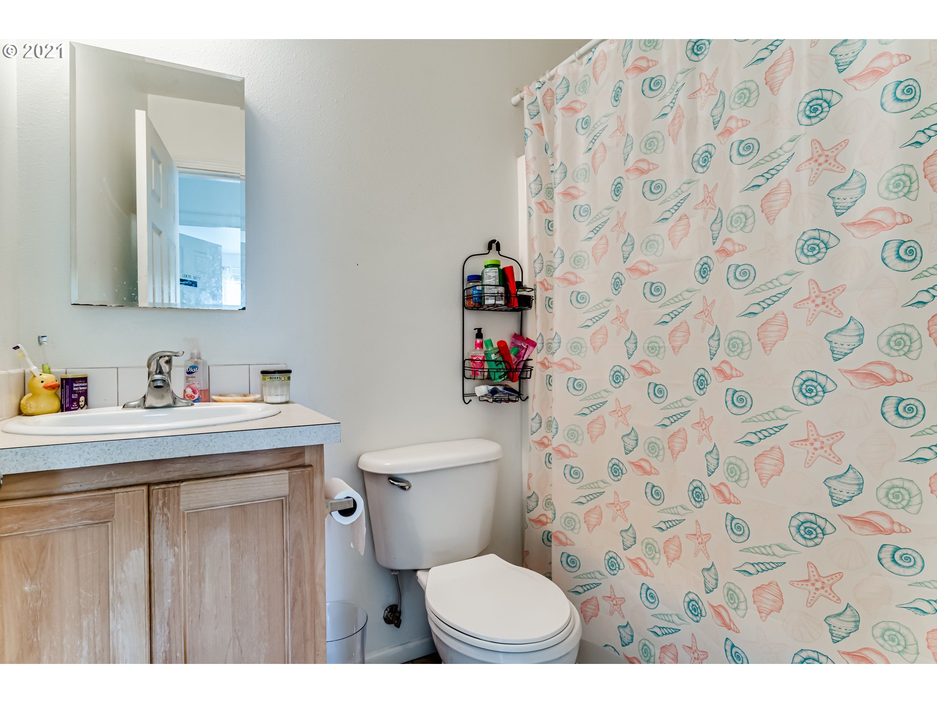 814 L Street Springfield, OR 97477 - Photo 15 of 23 a bathroom with a sink and a toilet