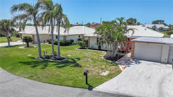 a view of a backyard with a patio