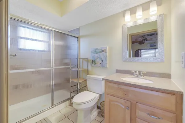 a view of a house with backyard and swimming pool