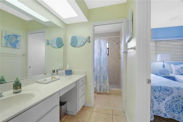 a aerial view of a house with swimming pool garden and patio