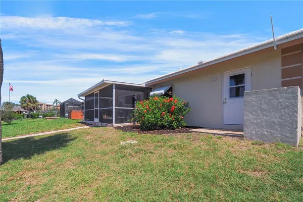 a view of a swimming pool with a patio
