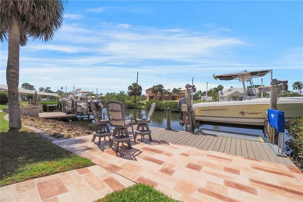 a garden view with a sitting space