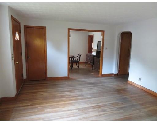 15 Sullivan Road Stoughton, MA 02072 - Photo 3 of 20 a view of empty room with wooden floor