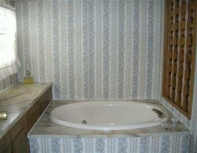 32700 Highway 6 Edwards, CO 81632 - Photo 4 of 5 a bathroom with a bathtub and a shower