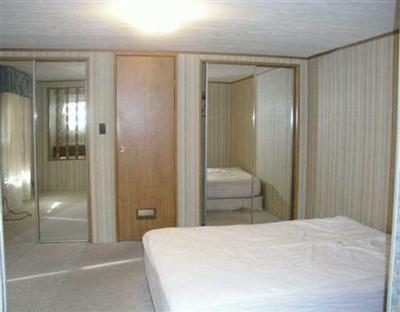32700 Highway 6 Edwards, CO 81632 - Photo 5 of 5 a bedroom with a bed and glass door