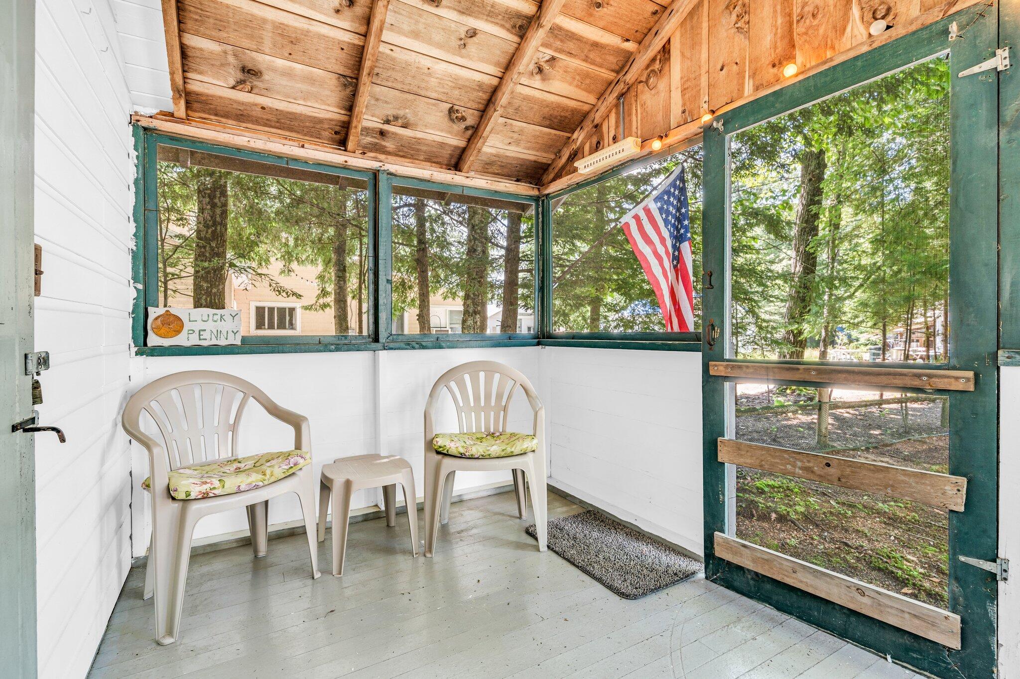 58 Quest Avenue Sebago, ME 04029 - Photo 36 of 44 58 Quest Lucky Penny porch 2
