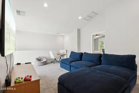 a living room with furniture and a couch