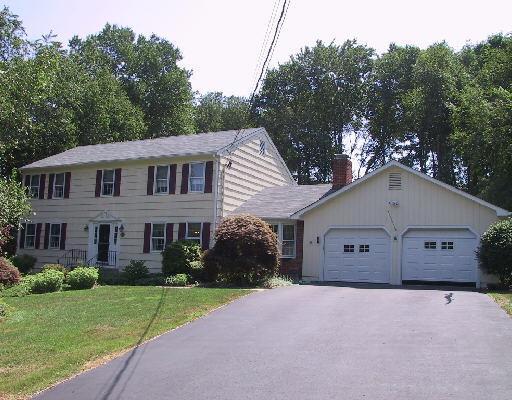 86 Firehouse Road Trumbull, CT 06611 - Photo 1 of 1 a front view of a house with a yard and garage