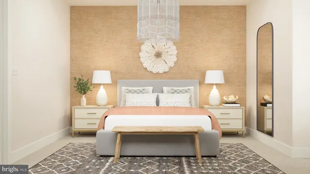 a bedroom with a bed and a lamp