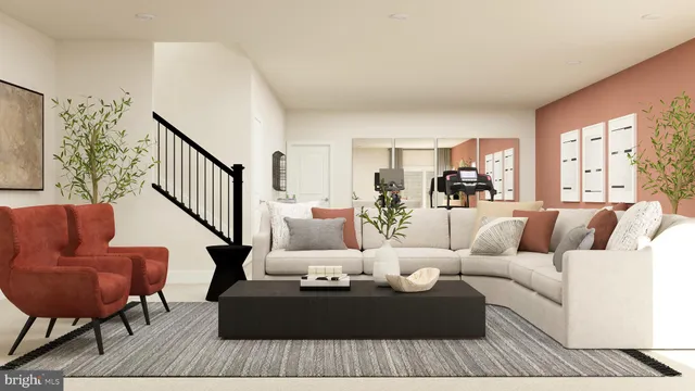 a living room with furniture or couch and a wooden floor