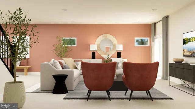 a living room with furniture a rug and a large window