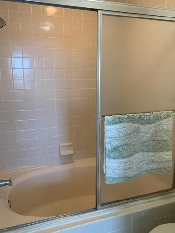 a bathroom with a bathtub