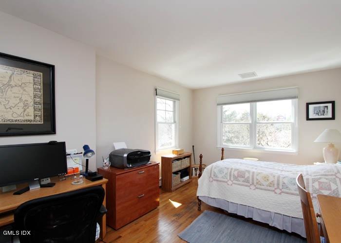 211 Sheep Hill Road Riverside, CT 06878 - Photo 7 of 9 a bedroom with a bed and a window