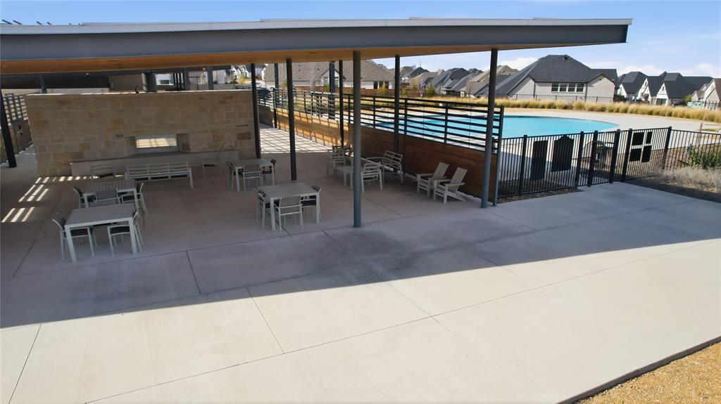 2188 Cloverfern Way Haslet, TX 76052 - Photo 29 of 30 a view of a swimming pool with outdoor seating