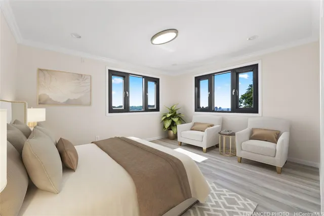 a bedroom with bed and a couch