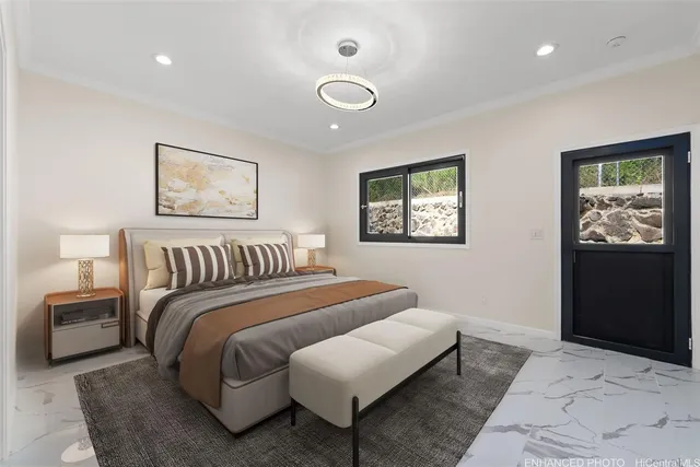 a bedroom with a bed and a painting on the wall