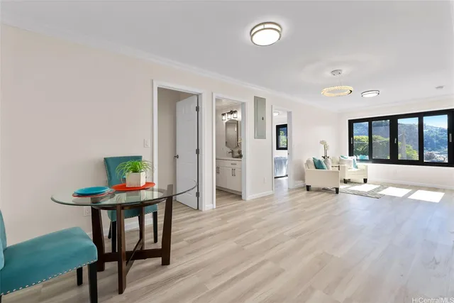 a living room with furniture and a table